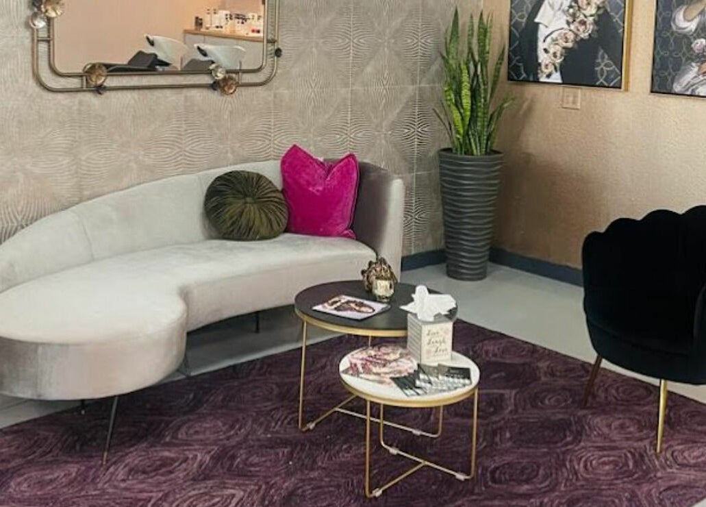 Stylish lounge at Boudoir hair concepts, Plano, Texas, US, featuring chic decor and plush seating.