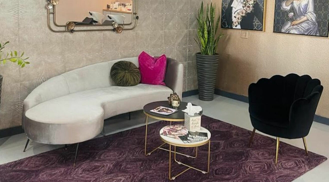 Stylish lounge at Boudoir hair concepts, Plano, Texas, US, featuring chic decor and plush seating.