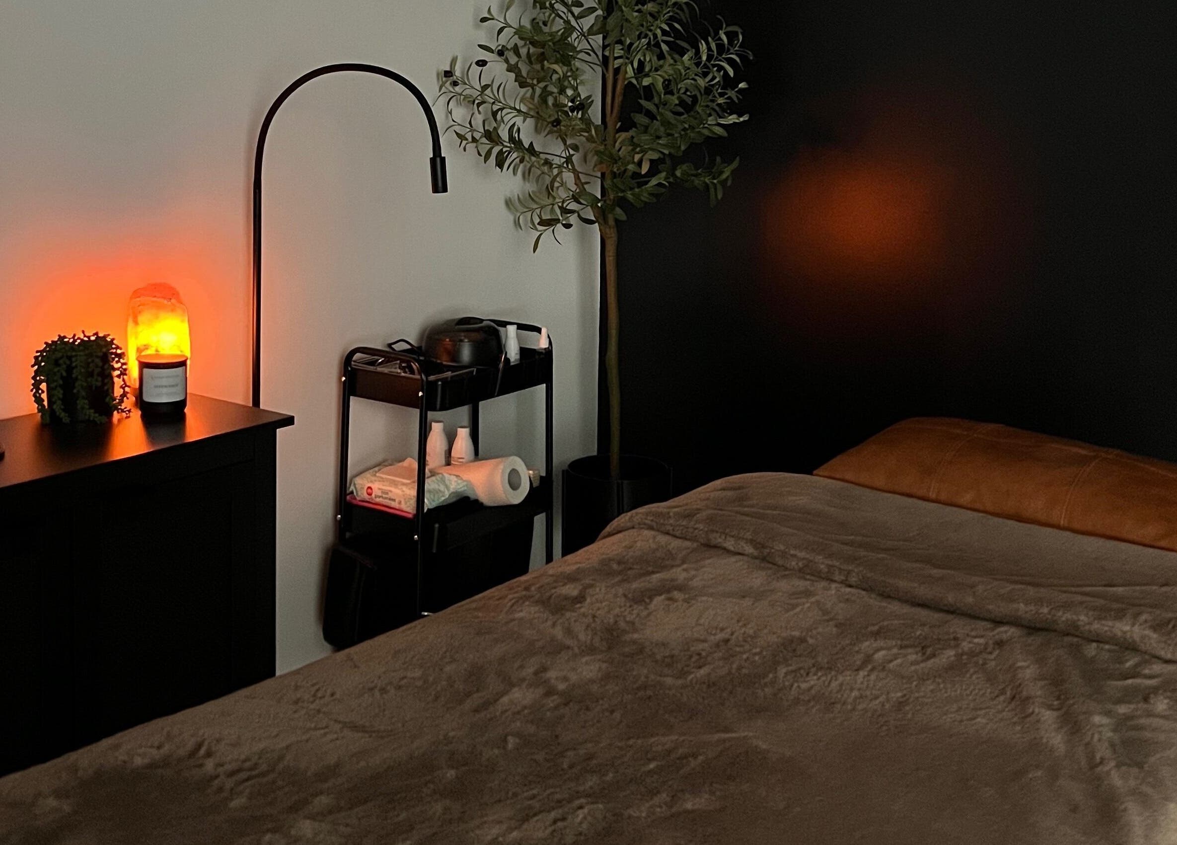 Tranquil spa room at Cloud Nine Beauty Studio, Tillsonburg, Ontario, CA with soft lighting and relaxing decor.