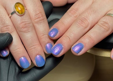 Shimmering purple and blue nails at Bonnie Beauty in Bomaderry, New South Wales, AU.