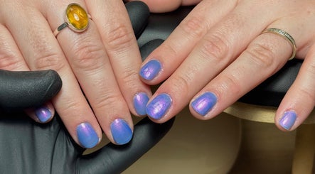 Shimmering purple and blue nails at Bonnie Beauty in Bomaderry, New South Wales, AU.