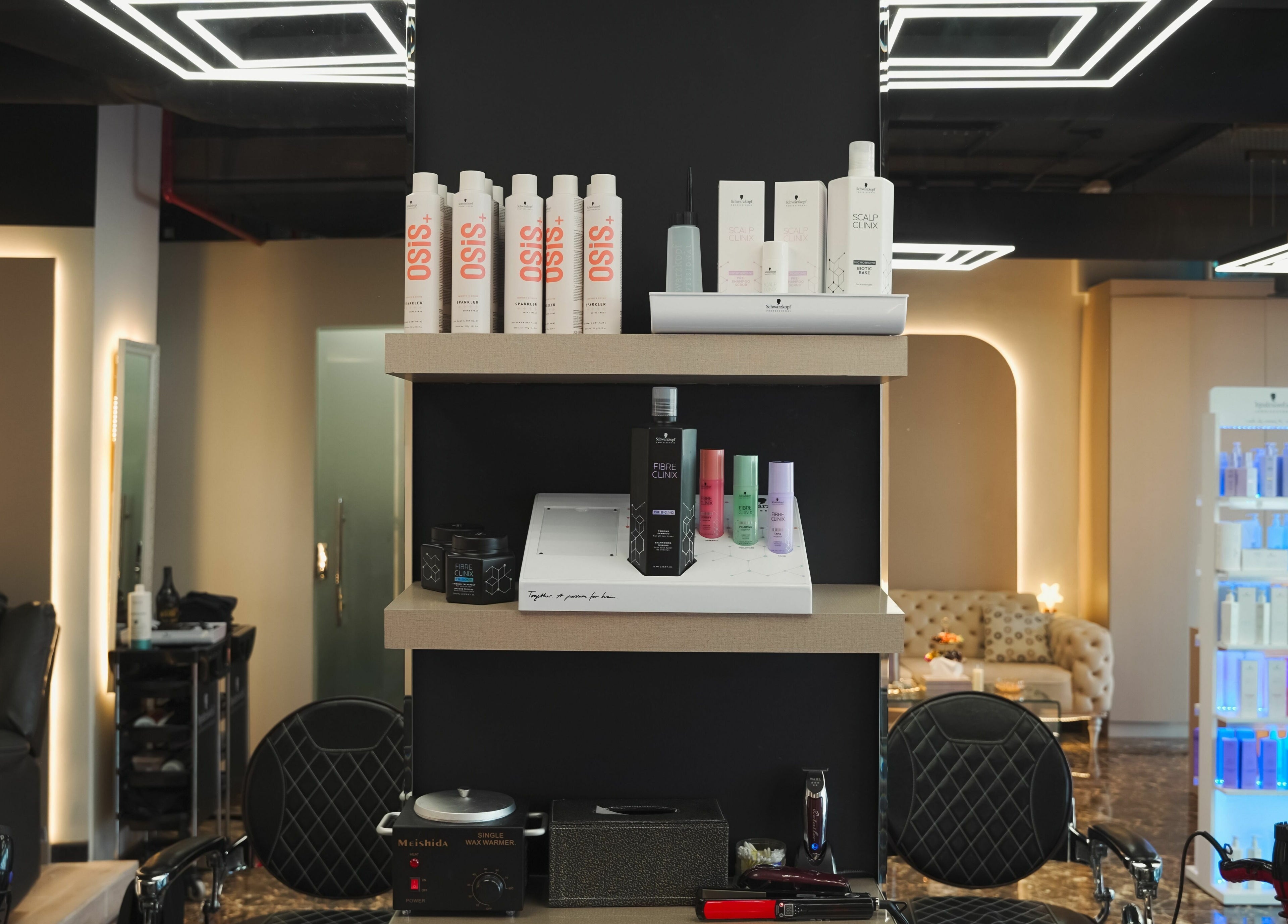 Product display shelves at Picasso Touch Salon For Gents in Abu Dhabi, AE showcasing premium haircare items.