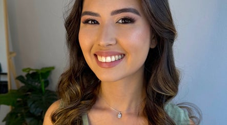Smiling client with glowing makeup, serviced by Hahn Beauty - Mobile Service in Brighton-le-sands, New South Wales, AU.
