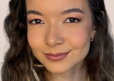 Close-up of a woman with glowing skin, showcasing makeup artistry by Hahn Beauty - Mobile Service, Brighton-le-sands, NSW.