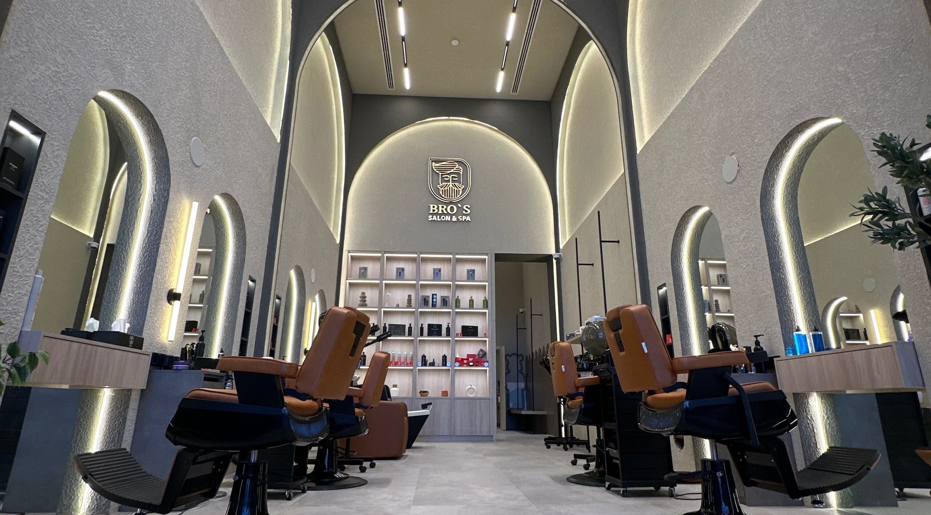 Luxurious interior of Bros Salon Tarout, featuring modern chairs, Al Qatif, Eastern Province, SA.