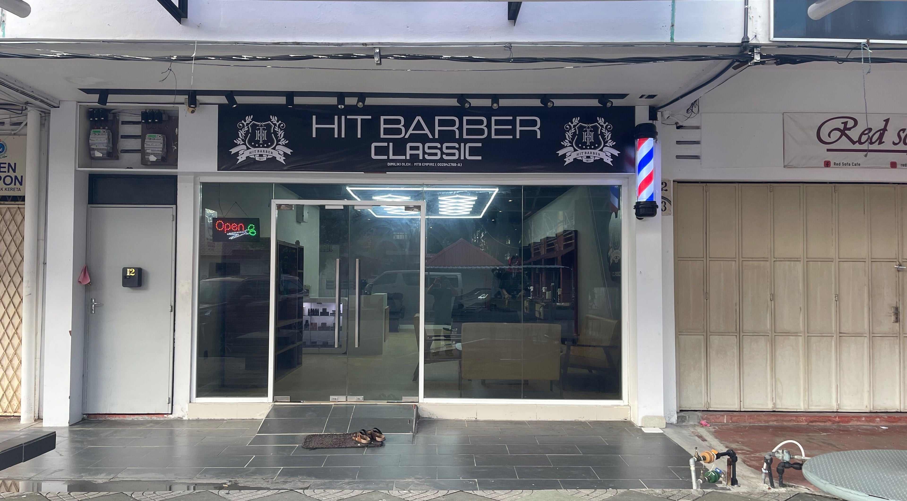 Exterior of Hit Barber Classic Langkawi, a stylish barbershop in Langkawi, Kedah, MY, with an inviting atmosphere.