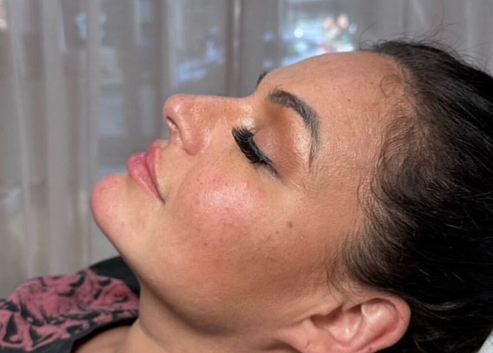 Client enjoying a beauty treatment at India Brown Aesthetics & Beauty in Addiscombe, England, GB.