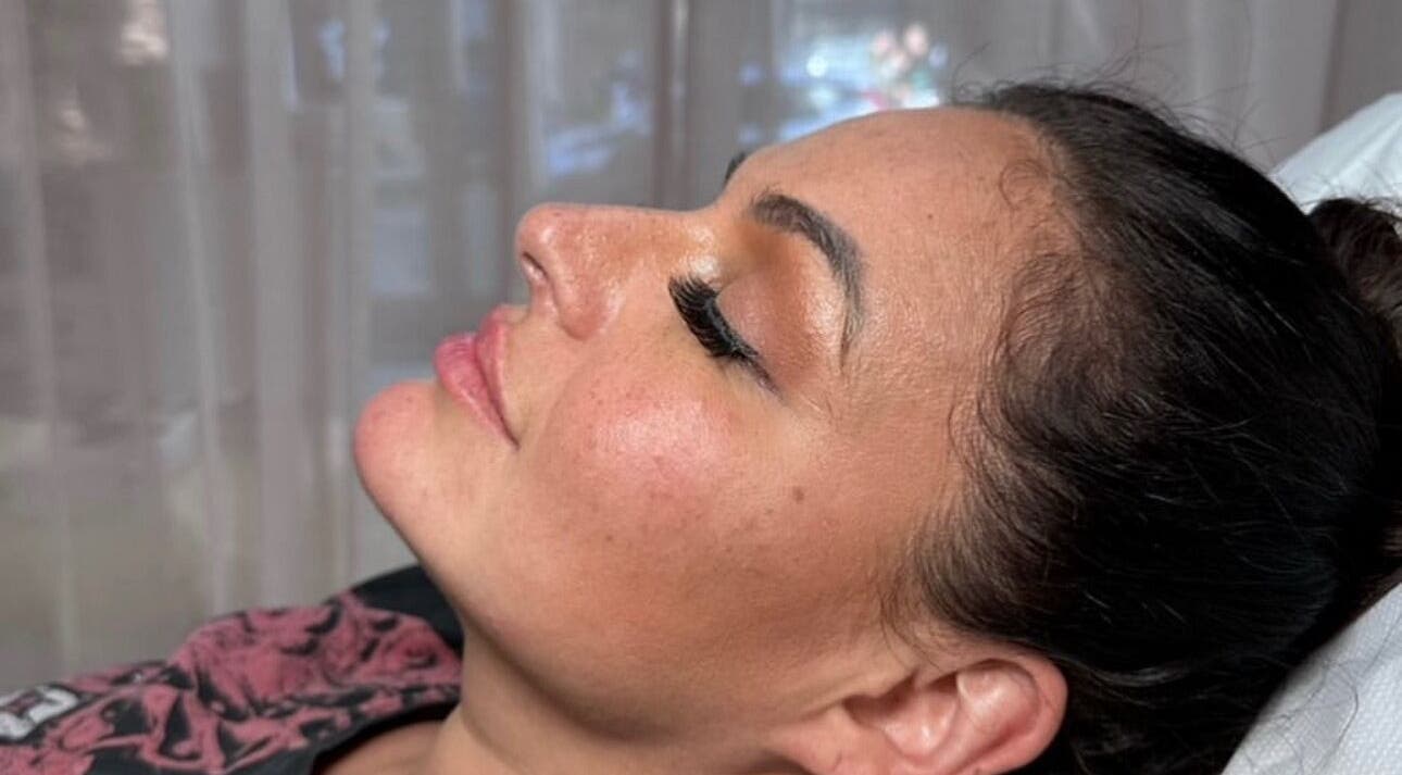 Client enjoying a beauty treatment at India Brown Aesthetics & Beauty in Addiscombe, England, GB.