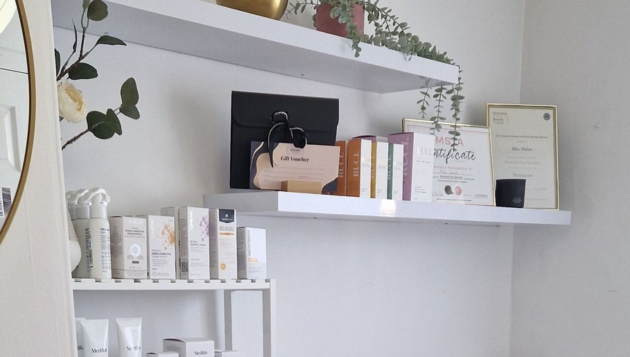 Product and certificate display at Reform Skin Clinic, Cawood, England, GB, showcasing elegant decor.