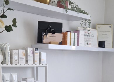 Product and certificate display at Reform Skin Clinic, Cawood, England, GB, showcasing elegant decor.