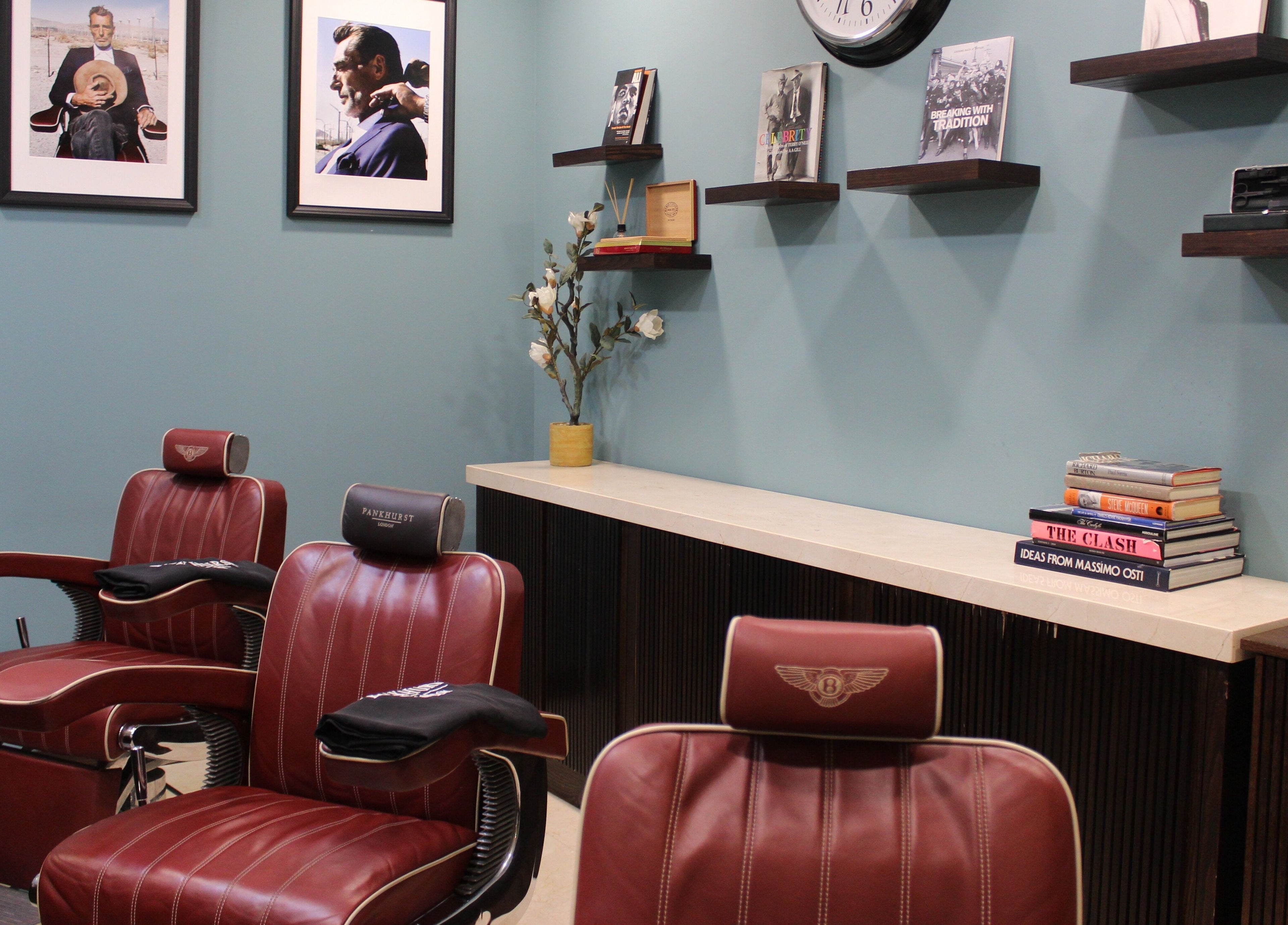 Stylish interior of Pankhurst London in Dubai, Dubai, AE, featuring luxurious barber chairs and elegant decor.