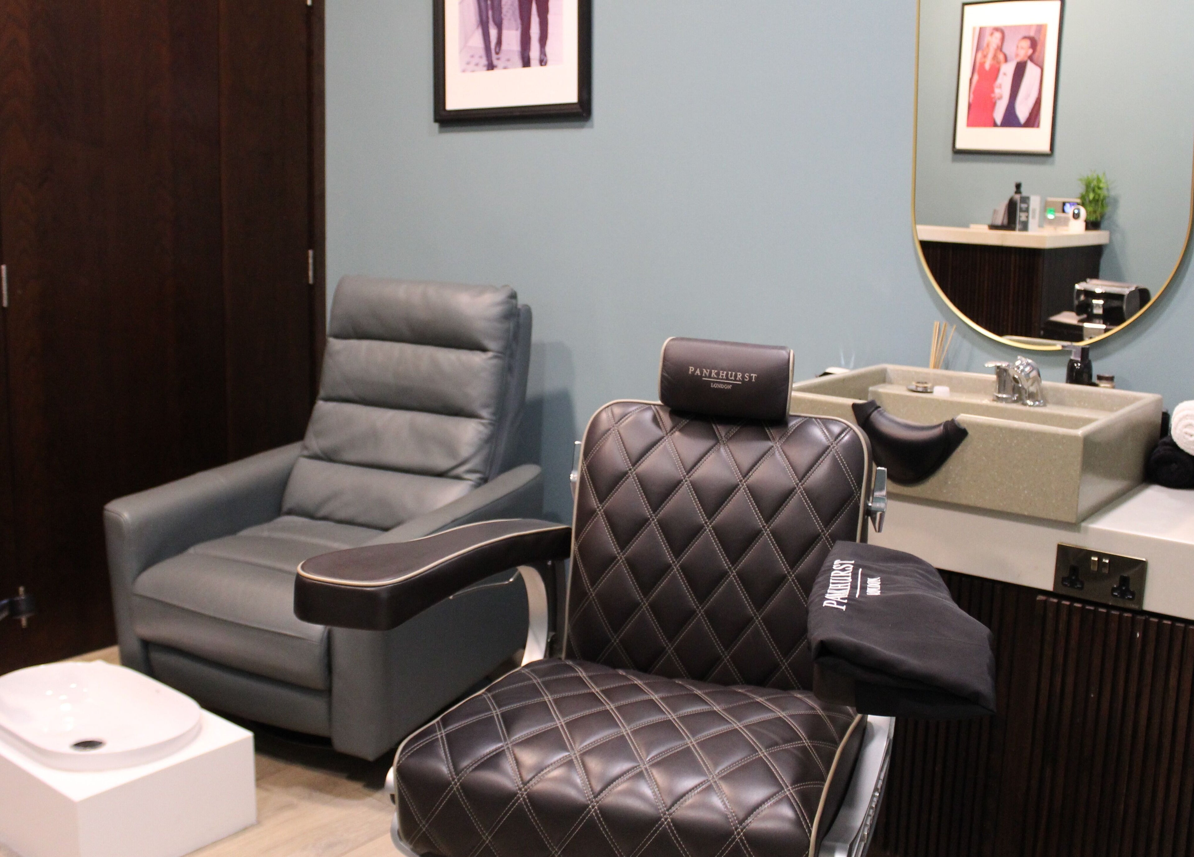 Luxury barber chair at Pankhurst London, Dubai, Dubai, AE, featuring elegant design and comfort.