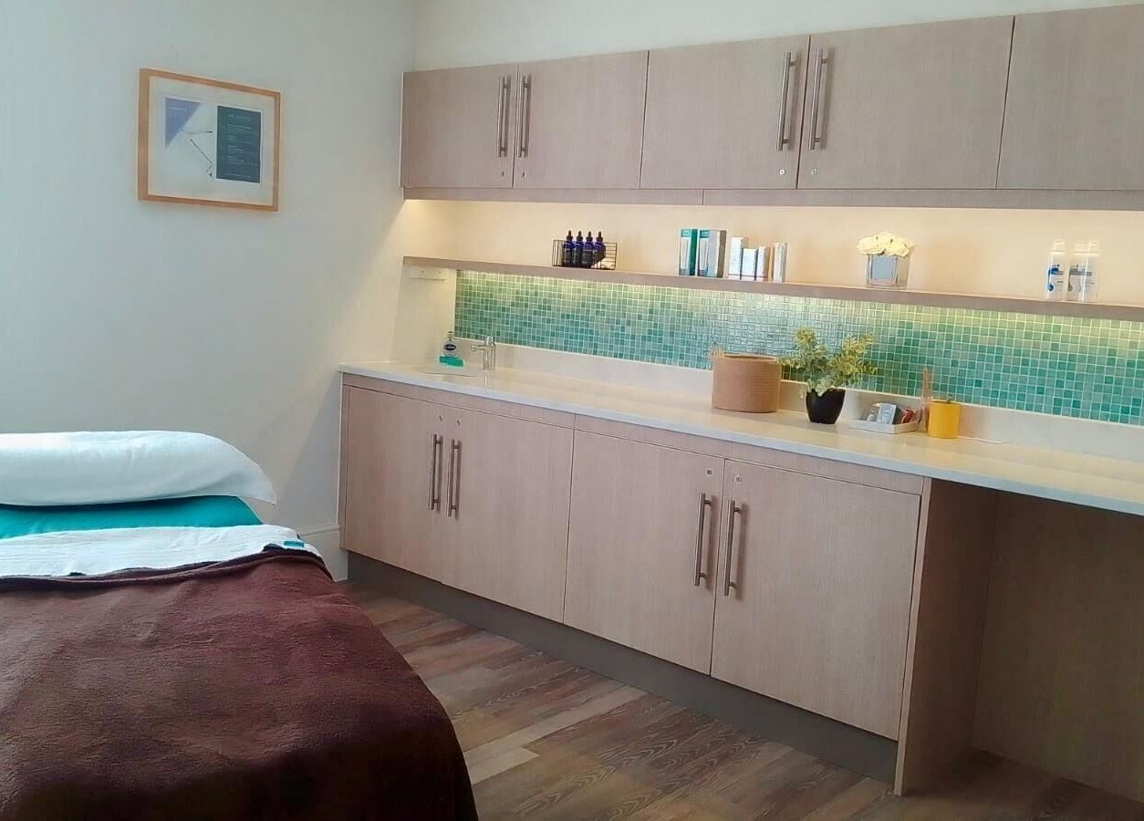 Peaceful spa treatment room at Gifford Lea, Chester, England, GB, with massage table and calming decor.