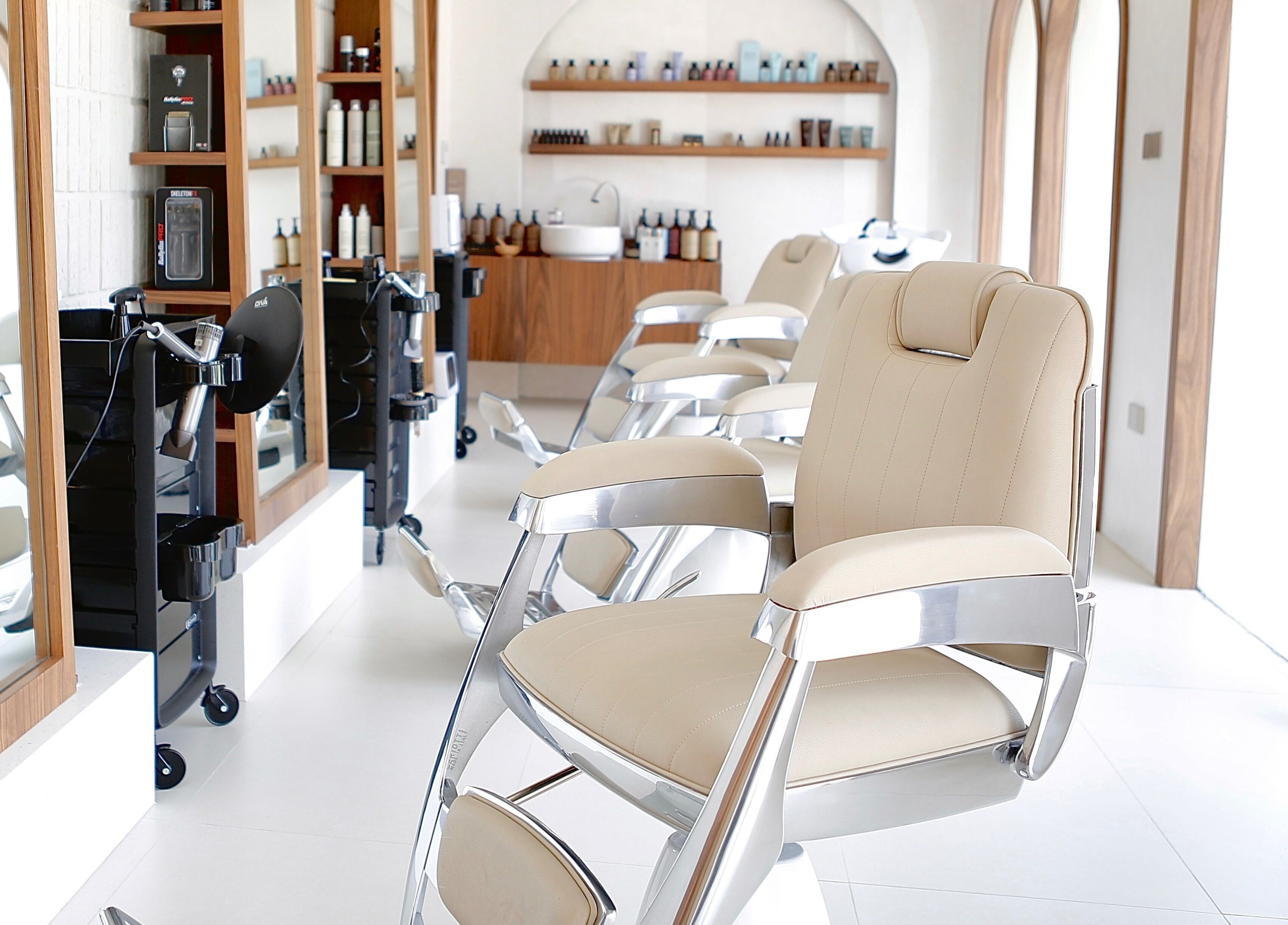 Luxurious salon chairs at Calma Massage & Spa, Al-seef, Bahrain, BH, enhancing your beauty experience.