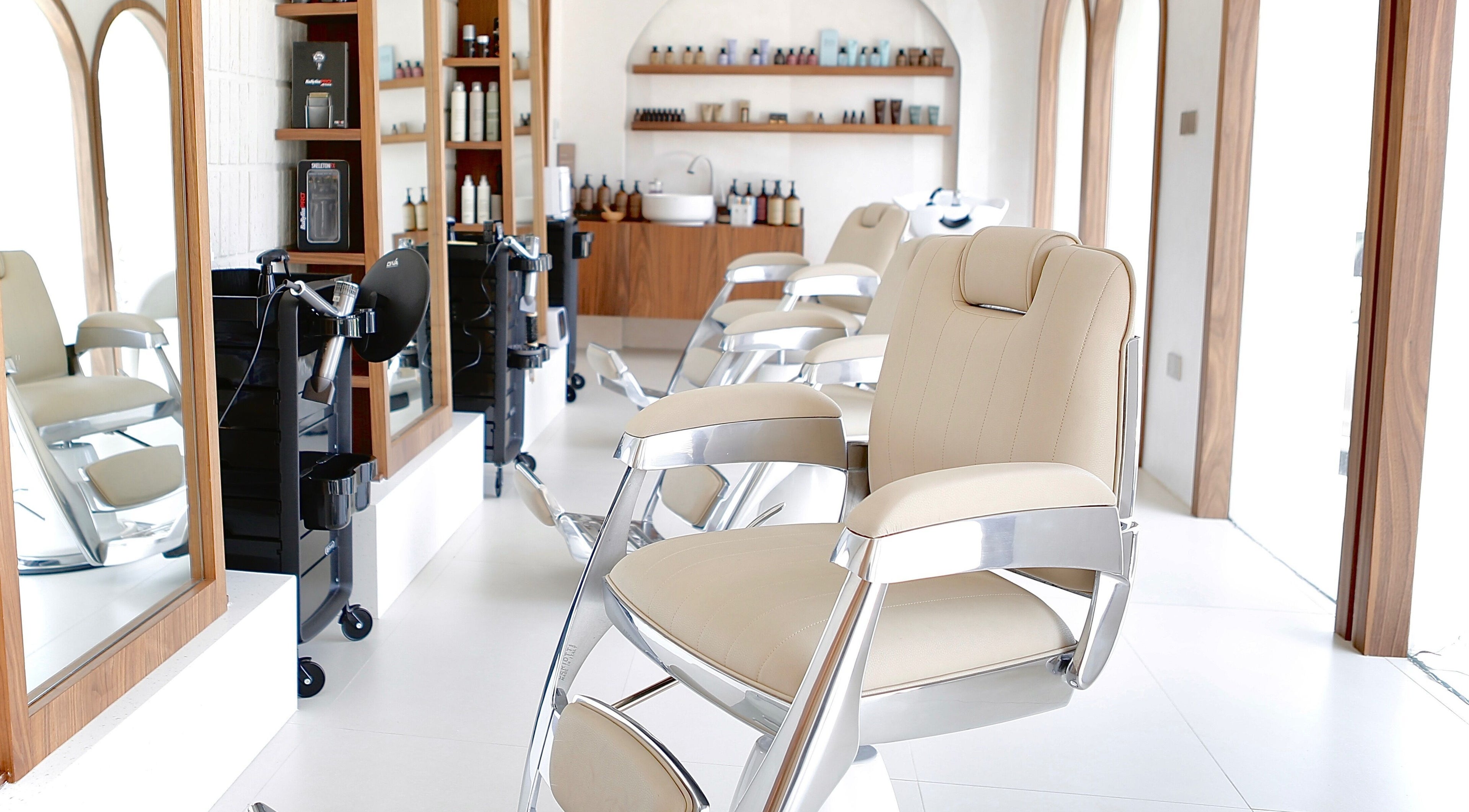 Luxurious salon chairs at Calma Massage & Spa, Al-seef, Bahrain, BH, enhancing your beauty experience.