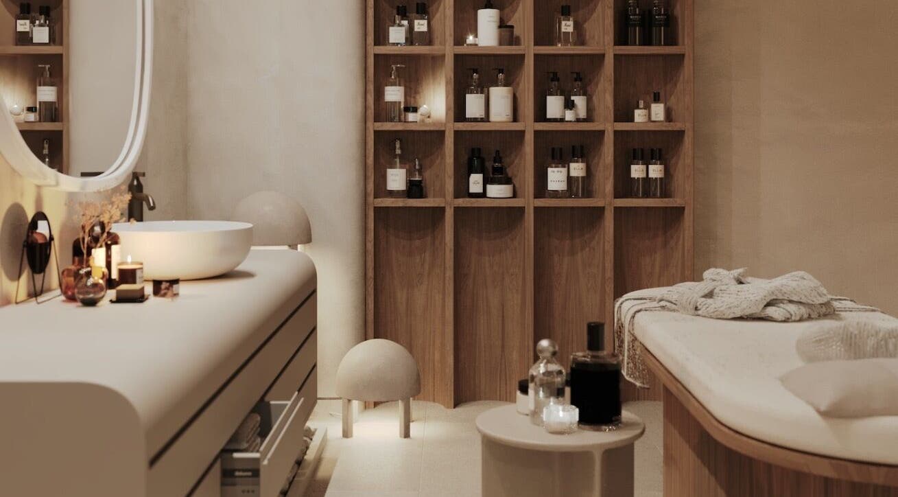 Relaxing treatment room at Calma Massage & Spa in Al-seef, Bahrain, BH with soothing decor and essential oils.