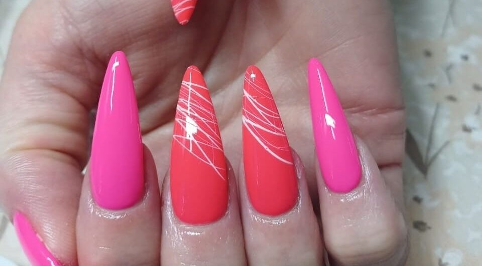 Bright pink and red nail art design at Mel's Nails & Beauty - Brits, showcasing creative styles in Brits, North West, ZA.