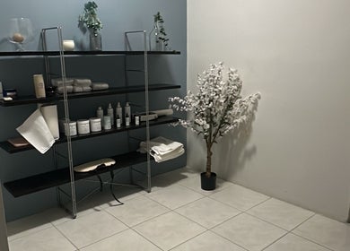 Modern shelving with beauty products at I Skin Beauty Center, Willemstad, Curaçao, CW.