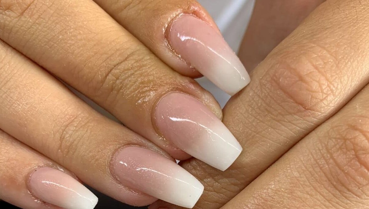 Elegant ombré nails at NDC Nails in Golden Square, Victoria, AU, showcasing a pink to white gradient.
