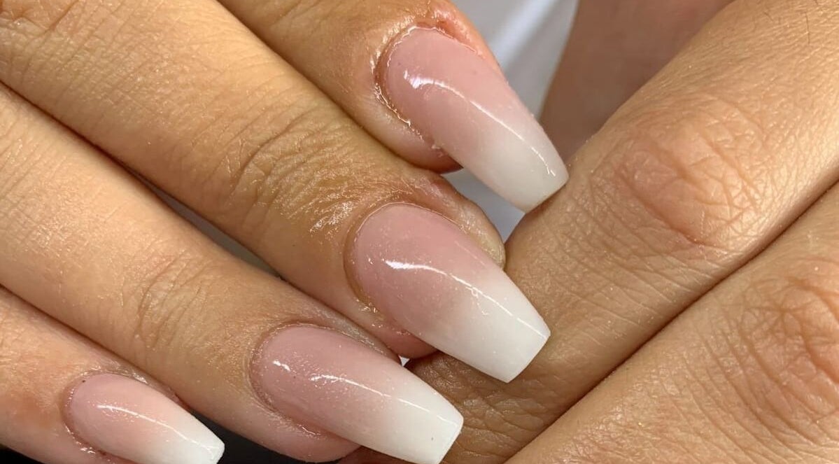 Elegant ombré nails at NDC Nails in Golden Square, Victoria, AU, showcasing a pink to white gradient.