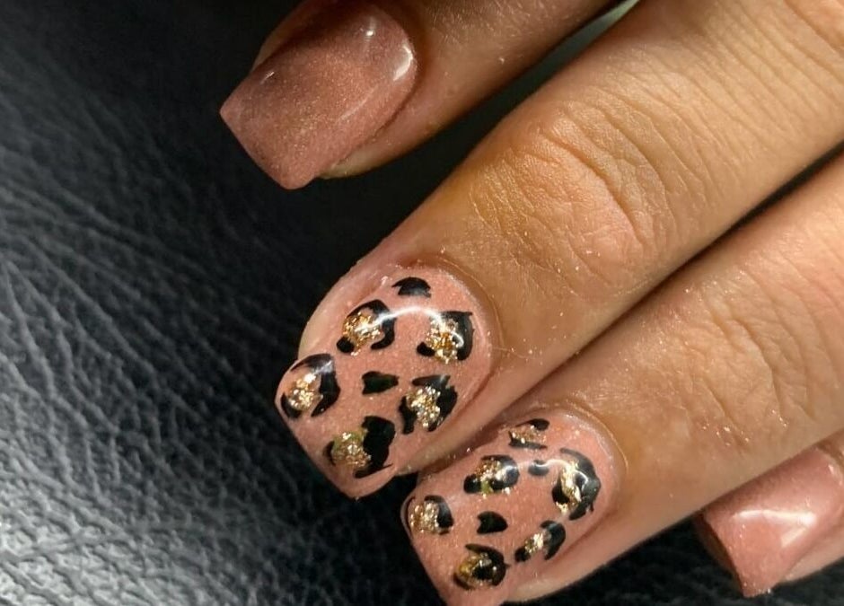 Elegant nail art with leopard print at NDC Nails, Golden Square, Victoria, AU.