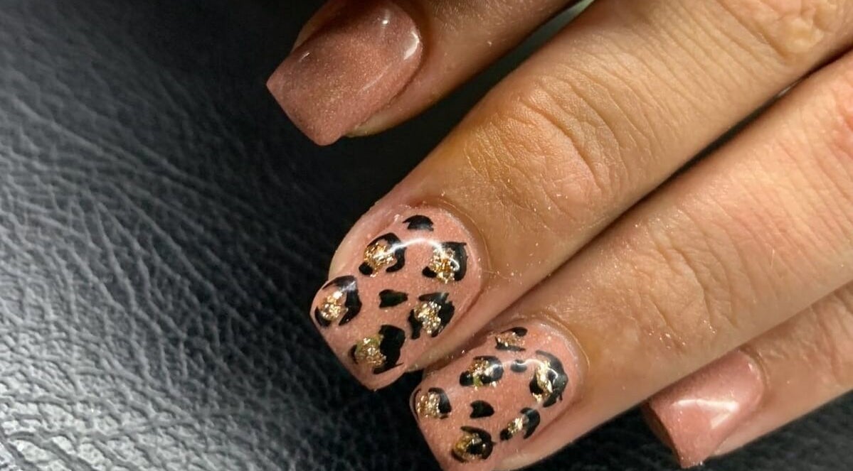 Elegant nail art with leopard print at NDC Nails, Golden Square, Victoria, AU.