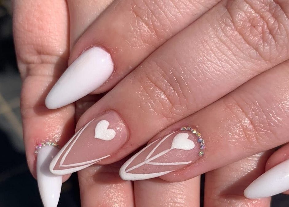 Elegant white and heart-themed nail design at NDC Nails, Golden Square, Victoria, AU.