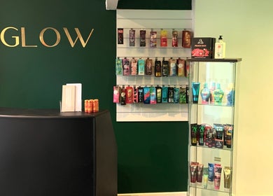 Welcome area at Glow Tanning and Beauty, Chelmsford, England, GB, showcasing tanning products.