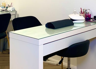 Modern nail station at Glow Tanning and Beauty in Chelmsford, England, GB offering premium nail care.