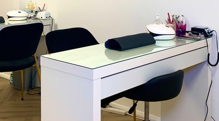 Modern nail station at Glow Tanning and Beauty in Chelmsford, England, GB offering premium nail care.