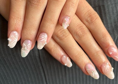 Elegant floral nail art at Glow Tanning and Beauty, Chelmsford, England, GB. Perfect for any occasion.