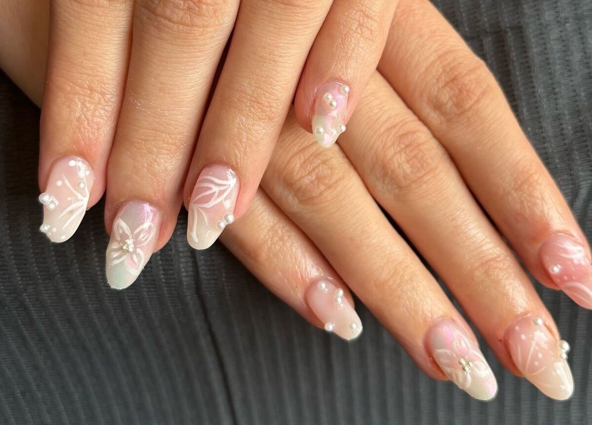 Elegant floral nail art at Glow Tanning and Beauty, Chelmsford, England, GB. Perfect for any occasion.