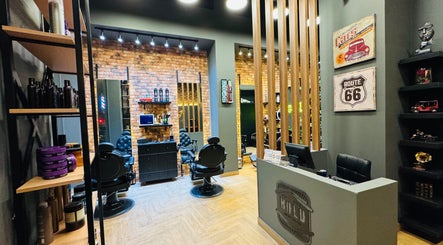 Interior of BOLD Men’s Salon in Dubai, Dubai, AE, featuring vintage barber chairs and decor.