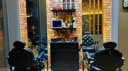 Modern barber chairs and grooming products at BOLD Men’s Salon, Dubai, Dubai, AE. Stylish, inviting interior.