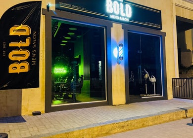 Illuminated exterior of BOLD Men’s Salon in Dubai, Dubai, AE showcasing the modern salon facade.