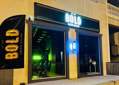 Exterior of BOLD Men’s Salon in Dubai, Dubai, AE lit at night showcasing stylish facade.