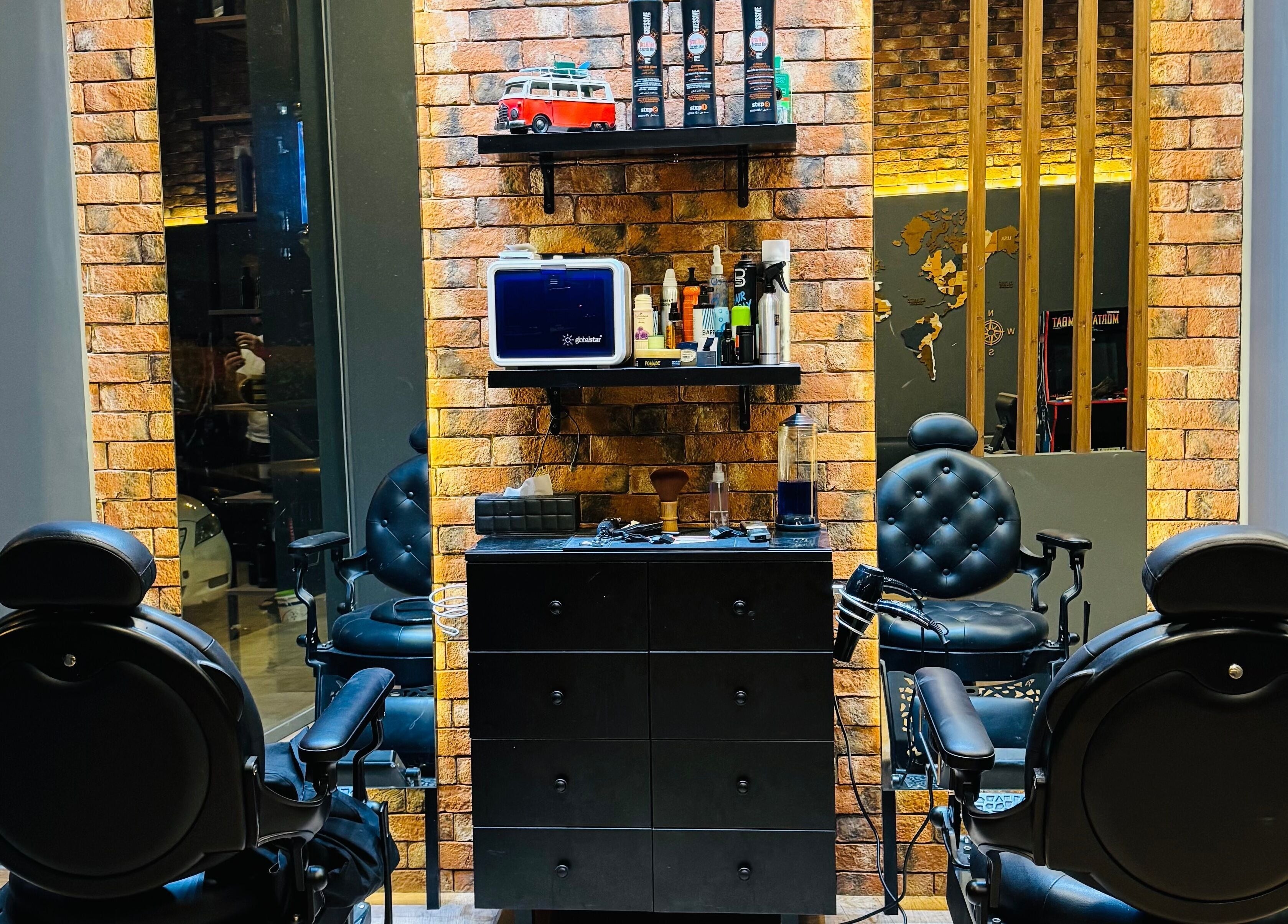 Modern barber chairs inside BOLD Men’s Salon in Dubai, Dubai, AE, featuring sleek design and equipment.