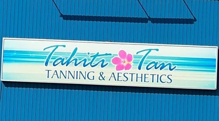 Tahiti Tan sign against a blue background in Saint John, New Brunswick, CA.