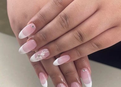 Chic French manicure with embellishments at Tahiti Tan, Saint John, New Brunswick, CA.