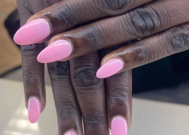 Close-up of perfectly manicured pink nails at Tahiti Tan in Saint John, New Brunswick, CA.