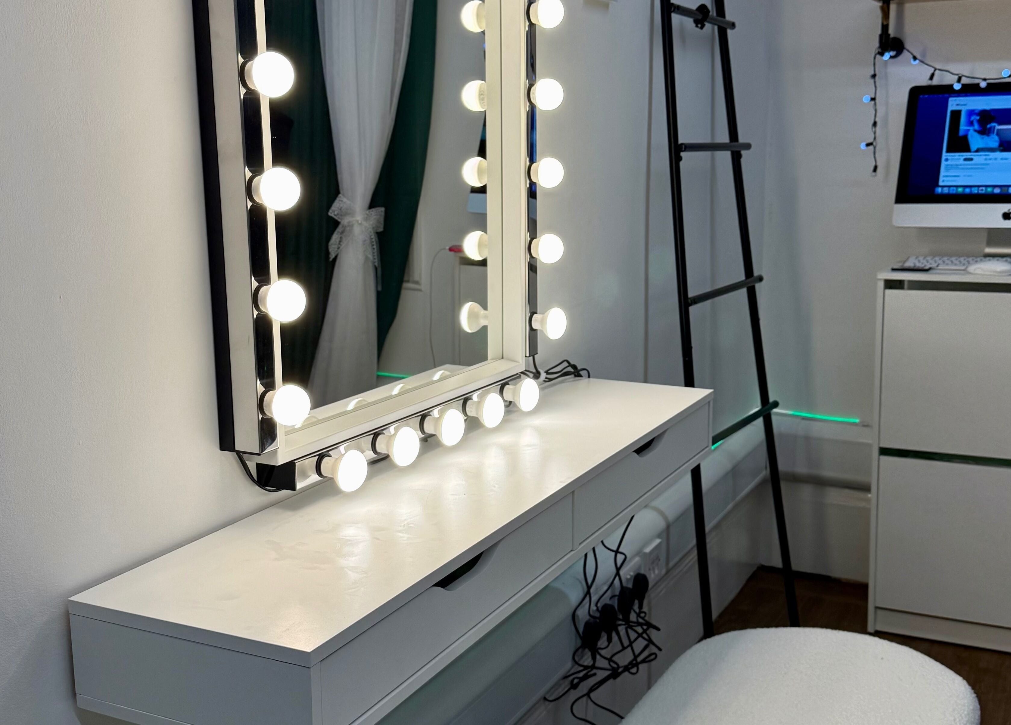 Modern vanity with mirror lights at Spa by BONITA in Guildford, England, GB.