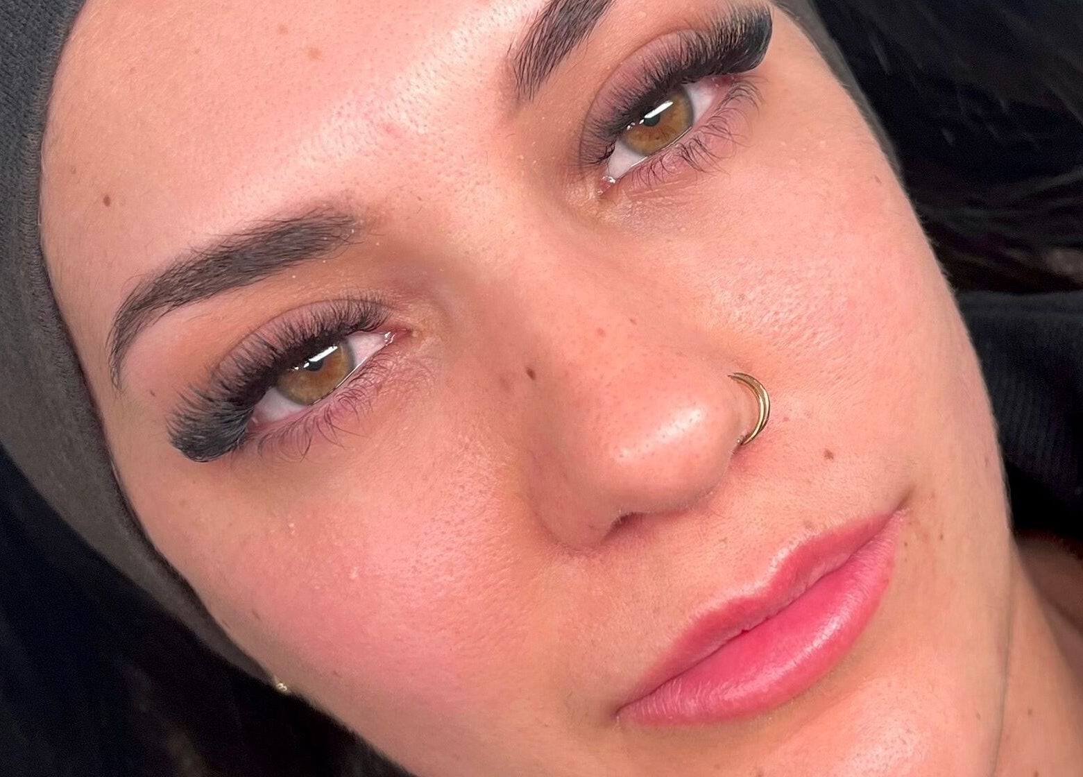 Close-up of a woman's eyes with lush lashes at Lash Love Lane, Melbourne, Victoria, AU.
