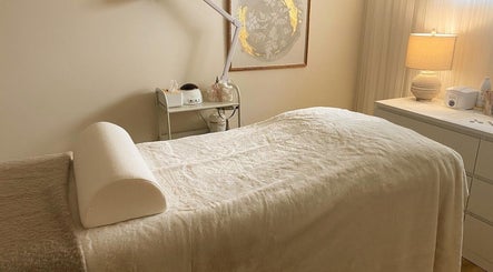 Cozy treatment room at The Natural Brow, Edmonton, Alberta, CA with plush bedding and calming decor.