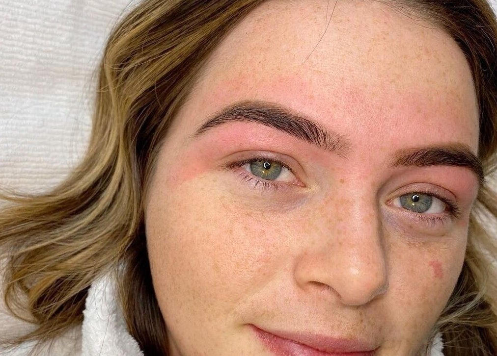 Perfectly shaped eyebrows at The Natural Brow, Edmonton, Alberta, CA, showcasing beauty treatment results.