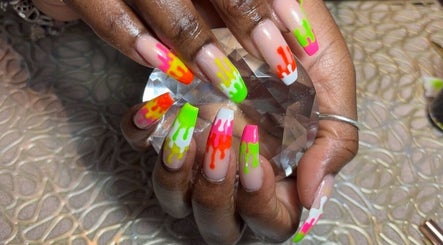 Colorful drip nail art at Nail Gallery & Beauty Bar, Nassau, New Providence, BS.
