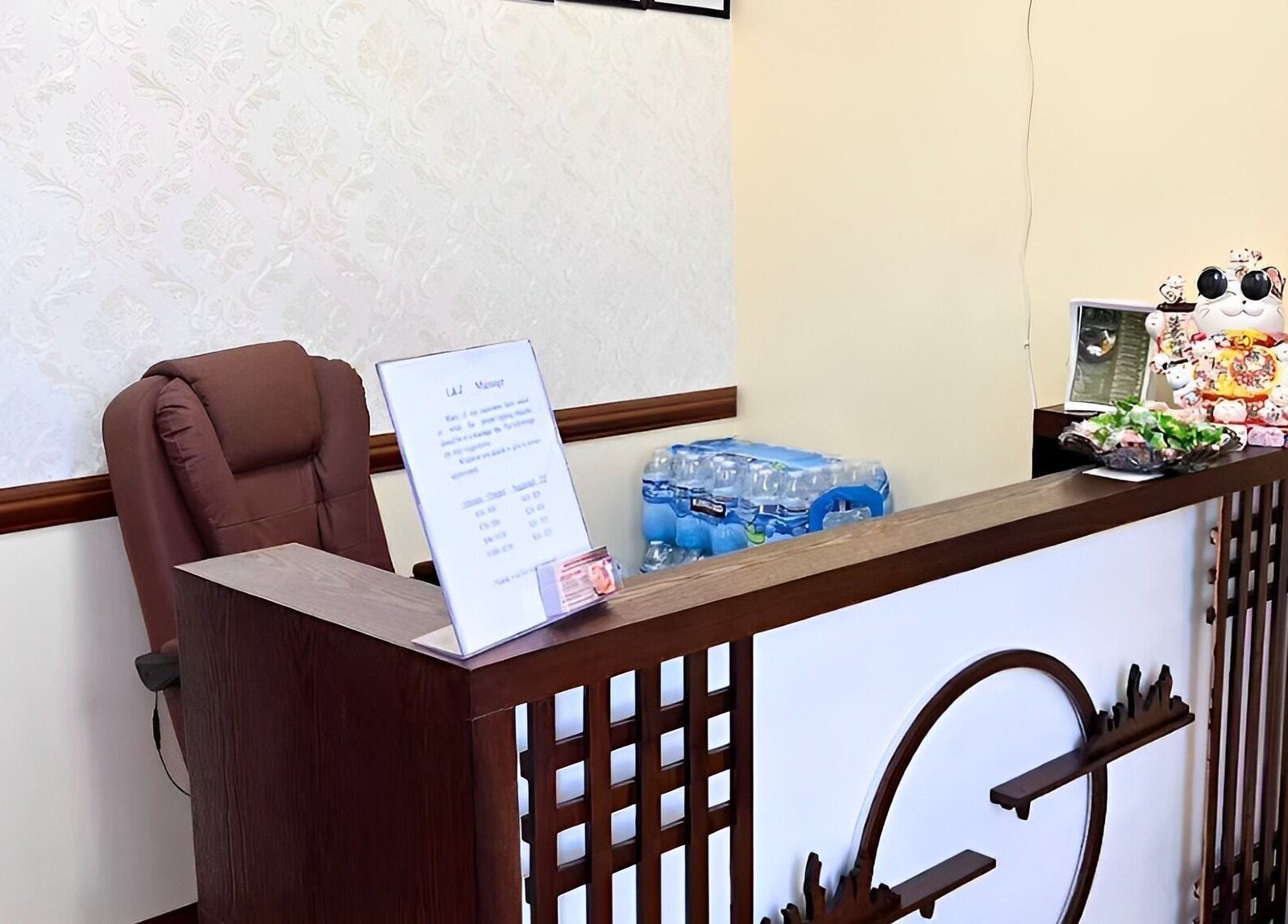 Reception area of Bristow Massage in Bristow, Virginia, US with chair and decor for a relaxing ambiance.