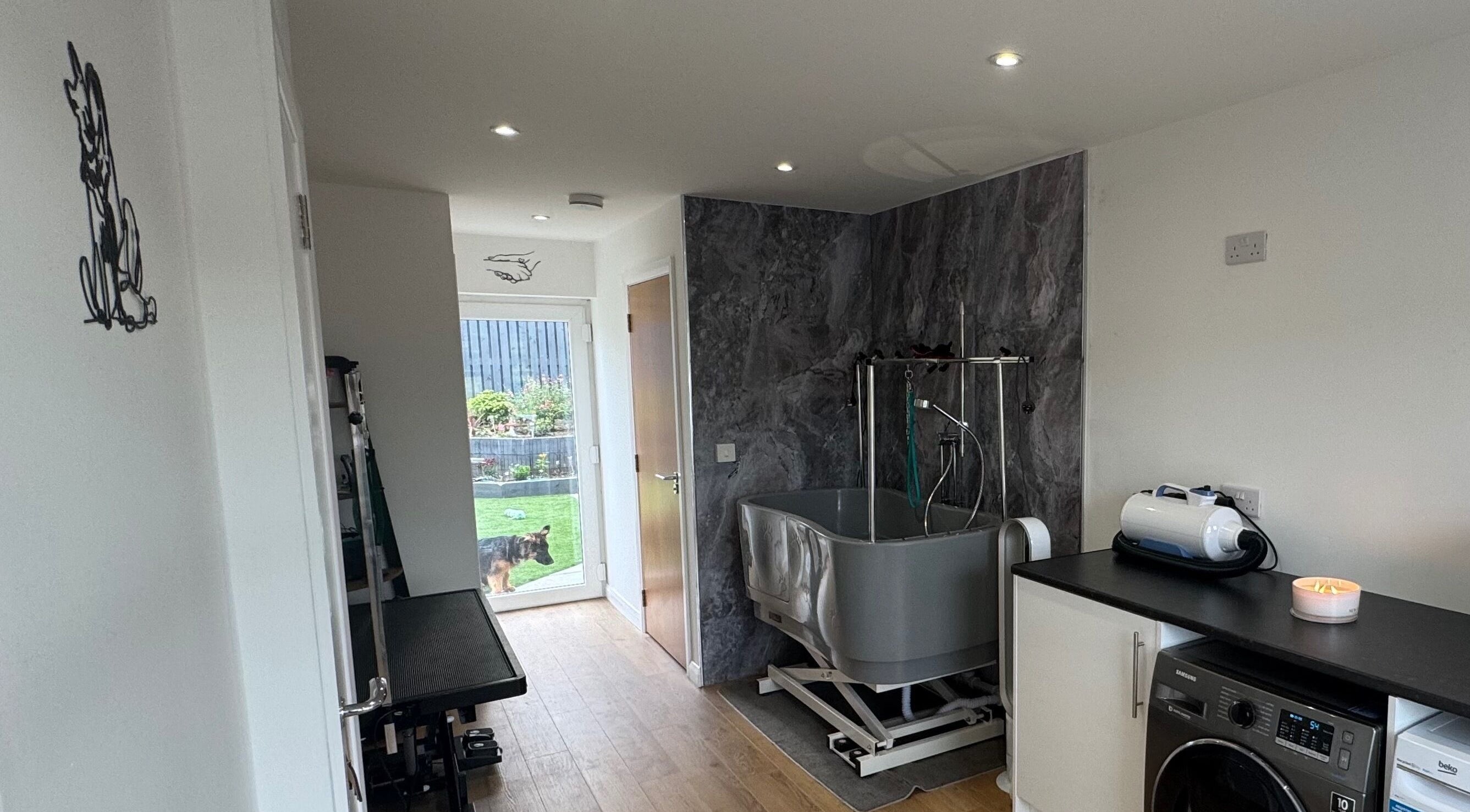 Modern grooming room at Zola’s Dog Grooming - Kirkcaldy, Scotland, GB, featuring a washing station and tools.