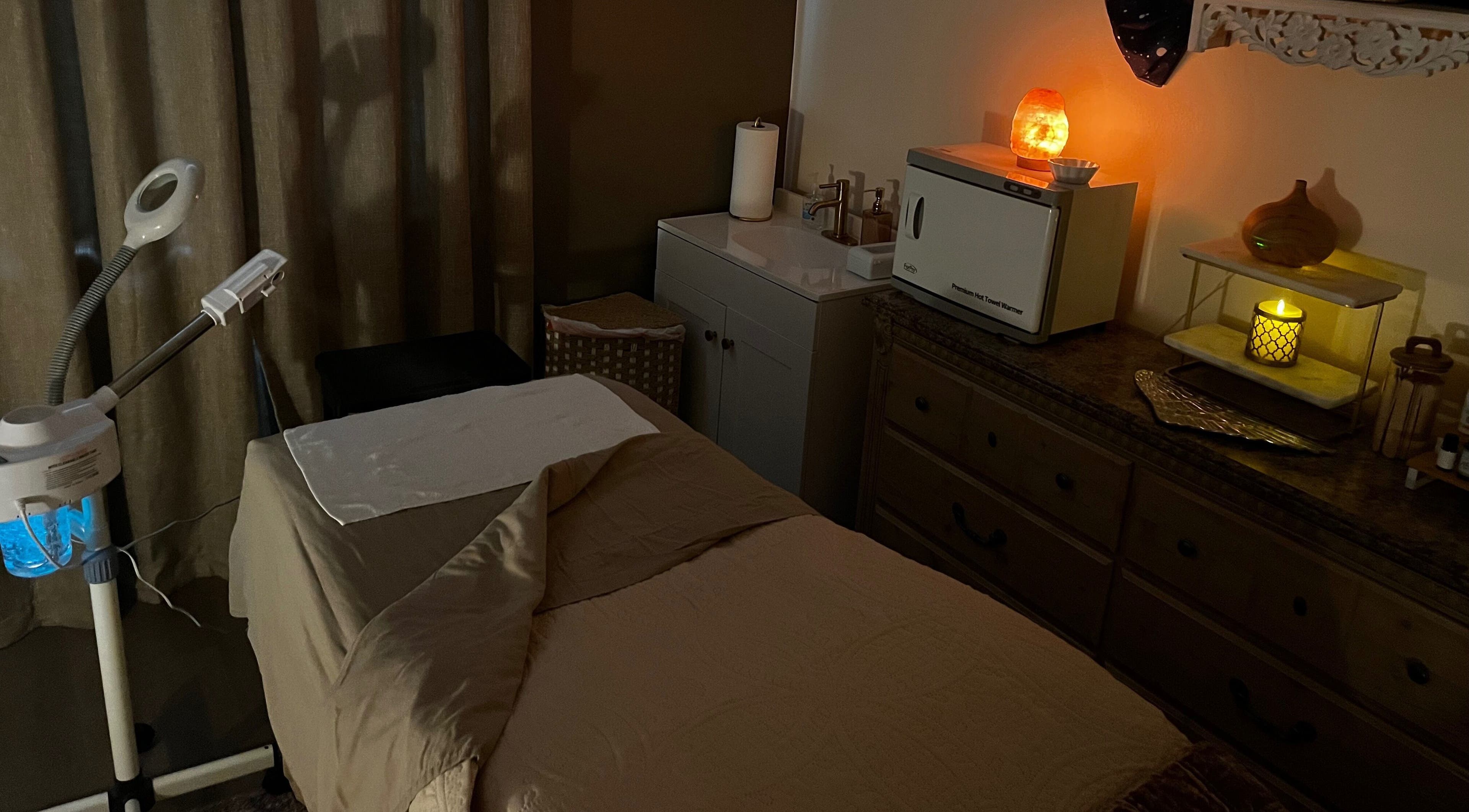Tranquil spa setup at Immaculate Skin, Santa Fe, New Mexico, US with calming candlelight ambiance.