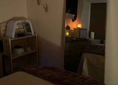 Relaxing treatment room at Immaculate Skin, Santa Fe, New Mexico, US, with calming warm lighting.