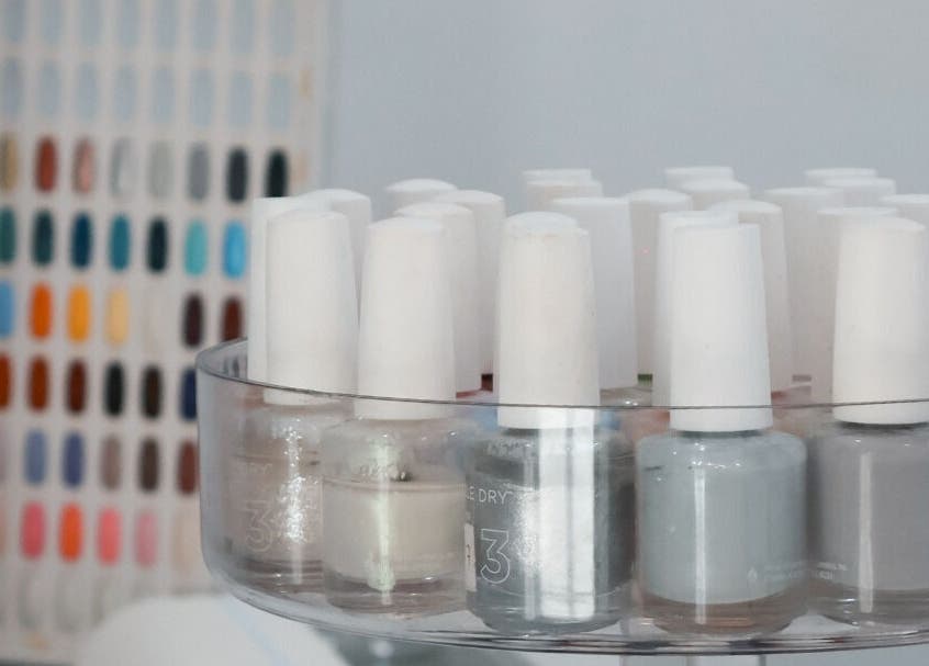 Close-up of nail polish display at Daline Nails, Dee Why, New South Wales, AU showcasing vibrant color options.